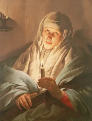 Eine Frau mit einer Kerze und einem Kreuz